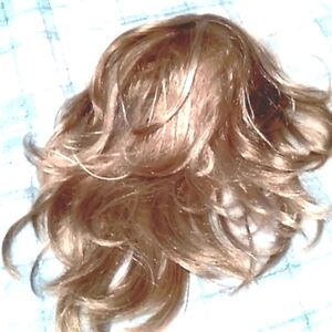 Medium Blond Blend Reversible drawstring  hair piece.  NIP.
